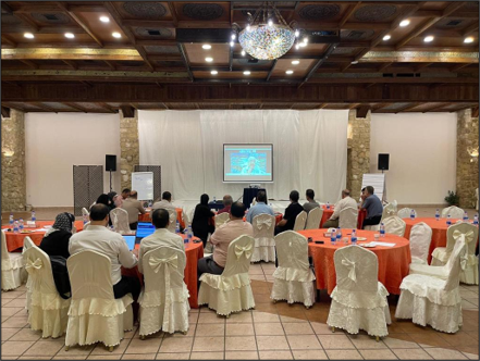 Participants attending a presentation at a local governance resilience workshop